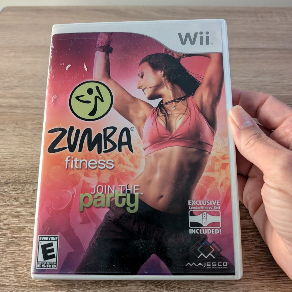 Nintendo Wii Zumba Fitness game with booklet